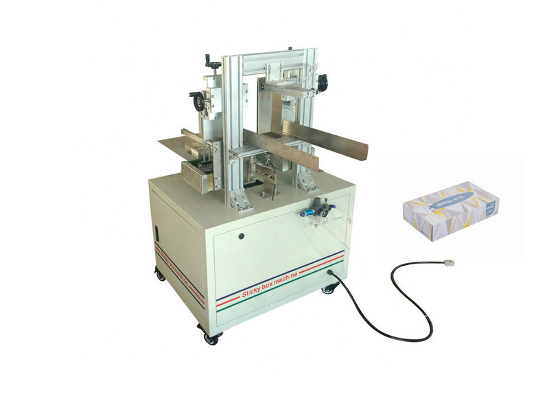 Box drawing facial tissue paper wrapping machine